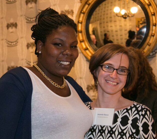 african american woman with lip piercing standing next to a white woman named jeannie