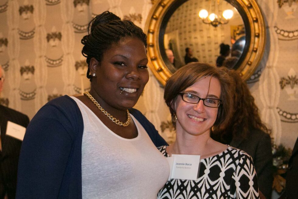 african american woman with lip piercing standing next to a white woman named jeannie