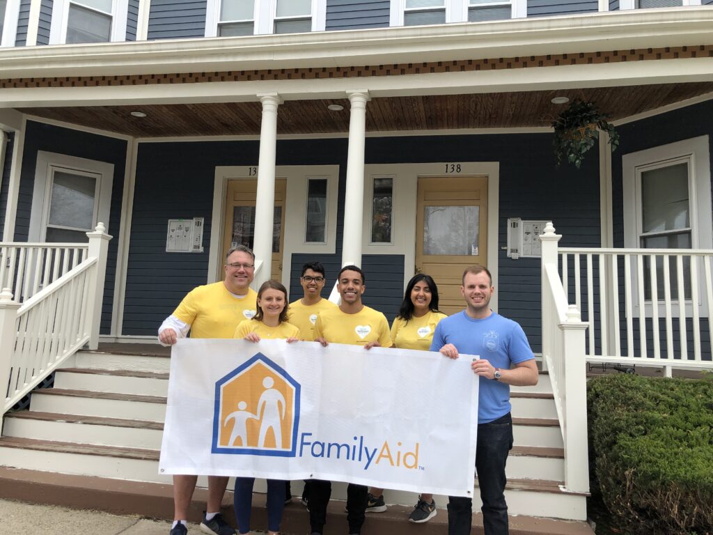 Liberty-Mutual-Insurance-Paints-House-for-Homeless-Families-FamilyAid