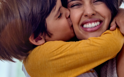 mom and son hugging