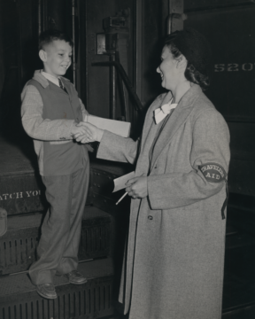 Historic Photo of Traveler's Aid Society of Boston worker with a child